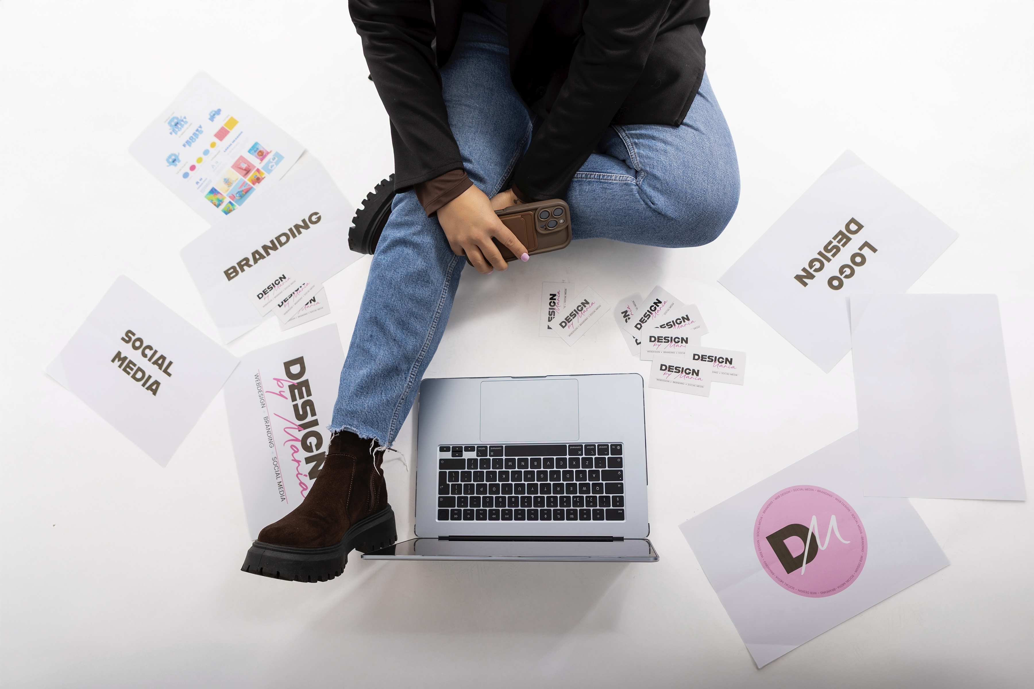 Maria Glowacka working on branding and logo design materials