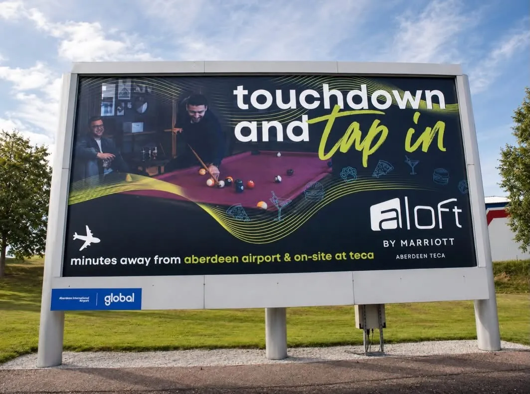 The installed Aloft airport banner seen up close